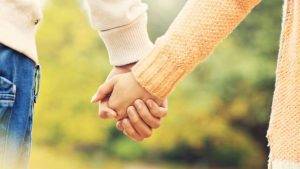 couple holding hands
