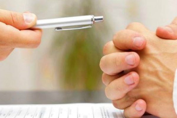 folded hands indicating indecision