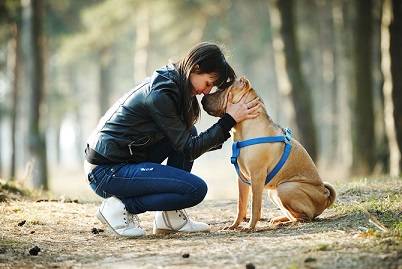 girl-with-dog-in-the-park
