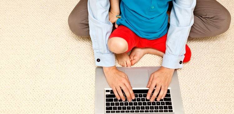 working parent with kid
