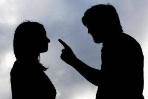 man abusing woman