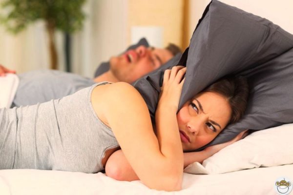 Man snoring disturbes wife