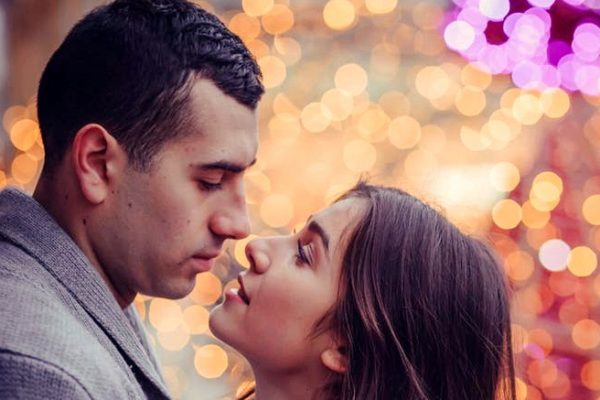 a loving couple gazing in eachother's eyes