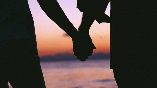 couple holding hands