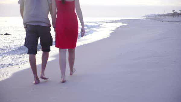 couple walking on beach