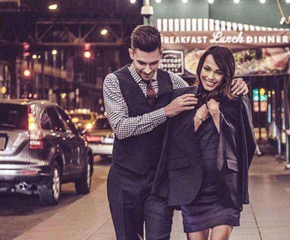 man-giving-woman-jacket