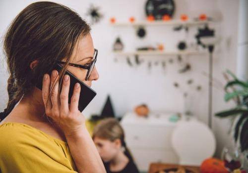 mother talking on smartphone