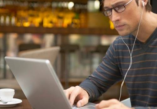 man working on laptop