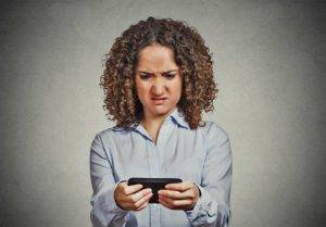 woman looking at phone