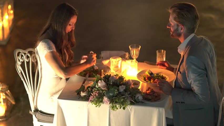 Arrange a candlelight dinner at home