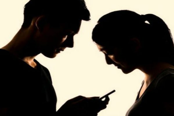 Couple Looking at Cellphone