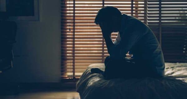 man feeling depressed