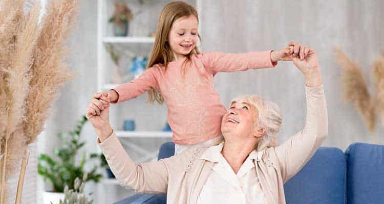 Grandmother playing with kid