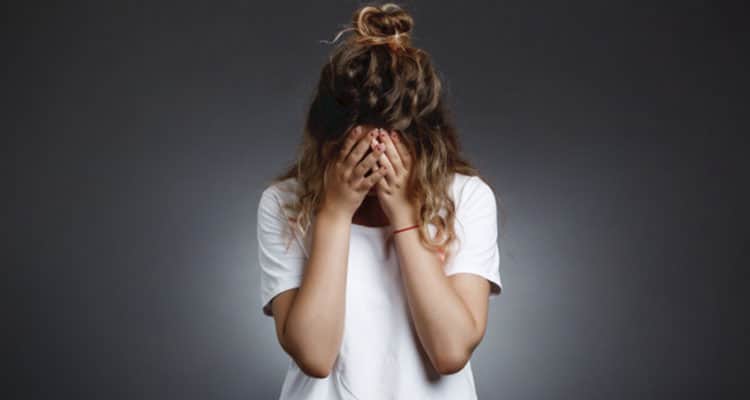 Hands on Face Woman