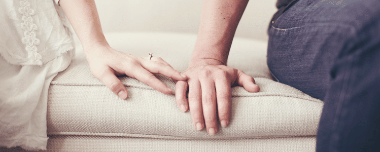 Hands on Sofa