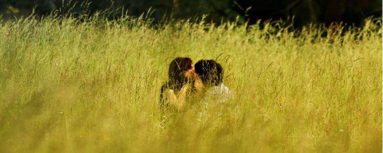 Kissing in Grass