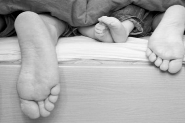 Three in Bed