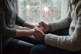 boy holding girl's hand