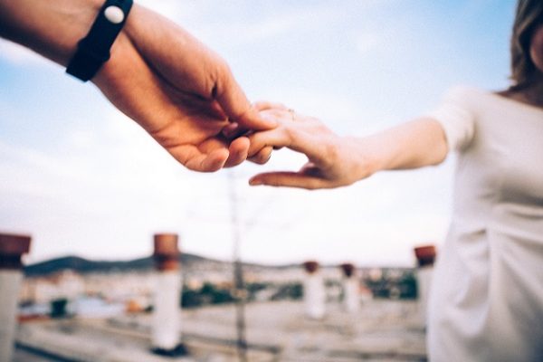 couple holding hands