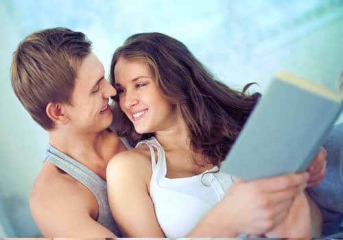 couple reading book together