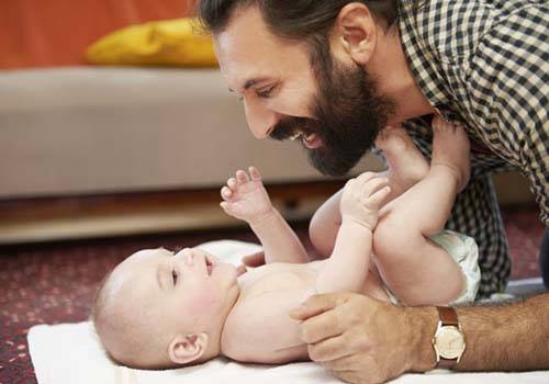 father rejoicing baby girl