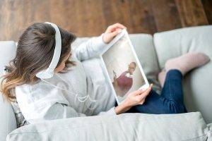girl looking at photo