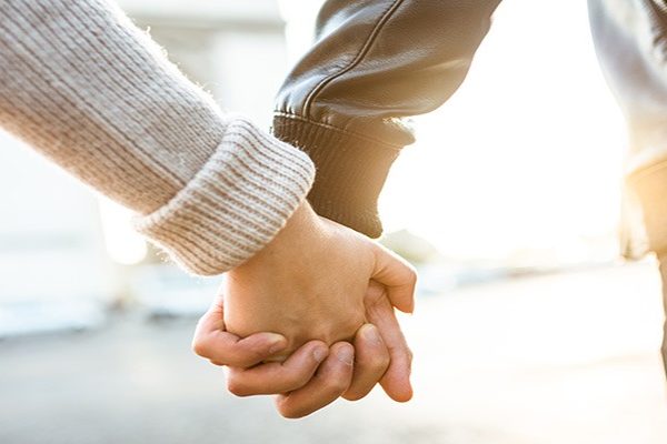 couple holding hands