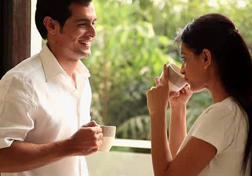 indian couple having coffee