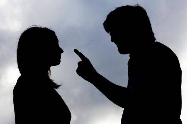man abusing woman