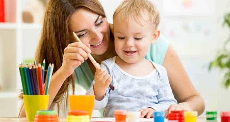 Mother child doing craft