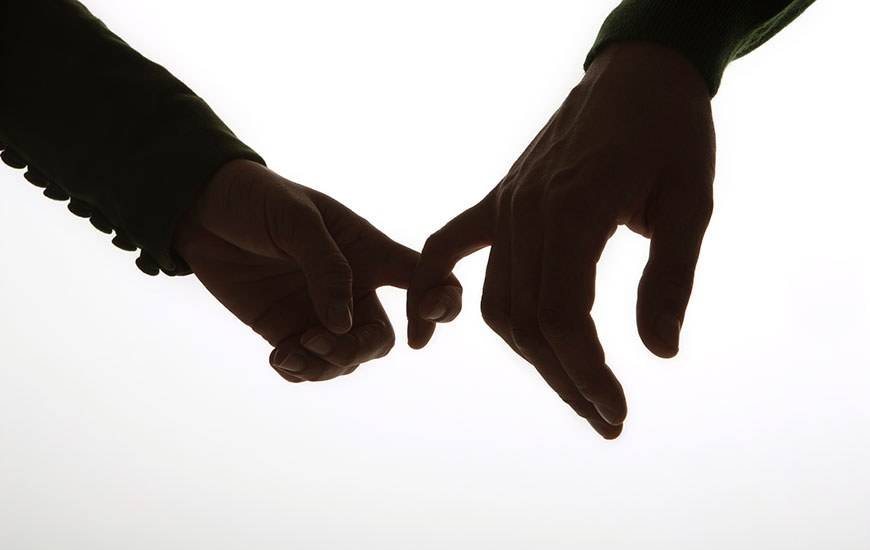woman holding hand