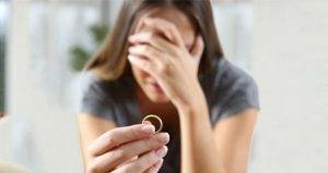 woman holding ring
