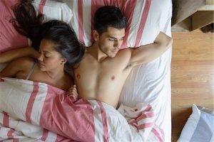 young couple in bed