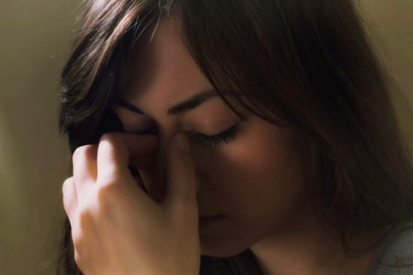 Profile of beautiful sad girl