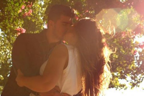 a happy couple kissing
