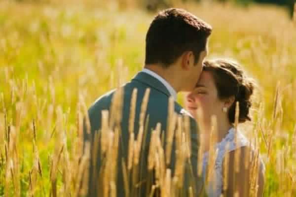 happy couple together in the field
