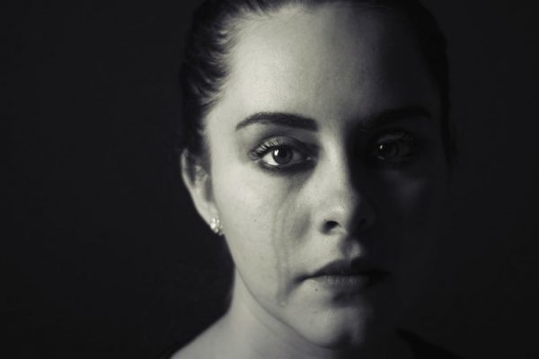 Woman sad because of husband's affair