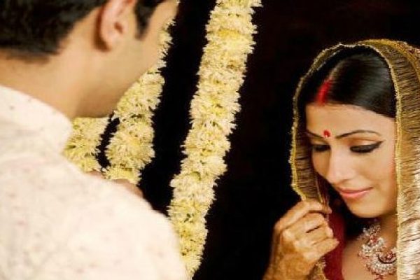 shy indian bride with groom