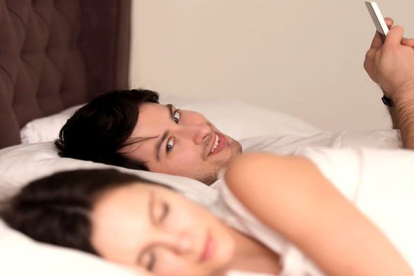 husband messaging ex after wife falls asleep
