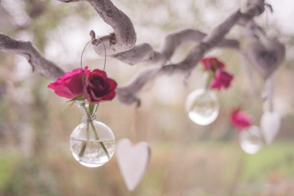 roses in glass flask