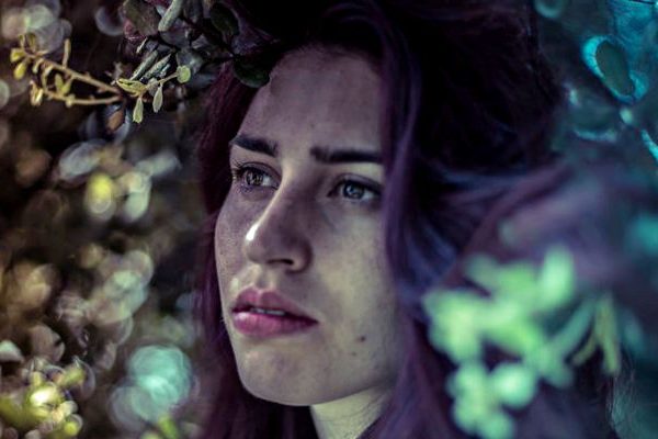 A sad girl in forest