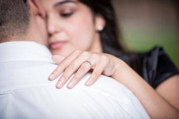wife's hand on shoulder