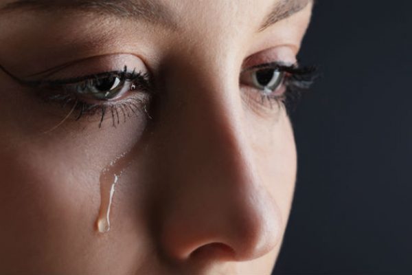 Sad woman with tears