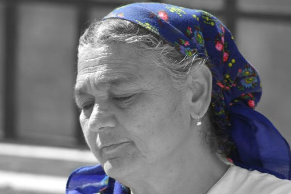Woman in blue scarf