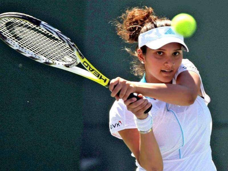 Sania Mirza plays tennis