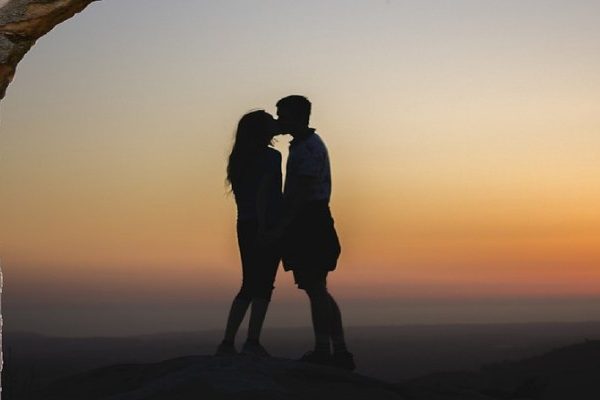 a couple kissing