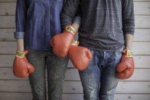 couple wearing boxing gloves