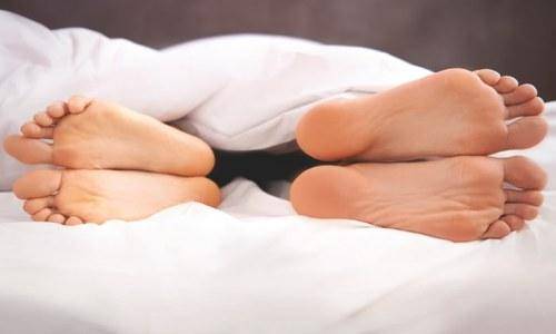Couple sleeping in different position