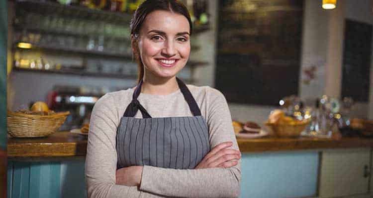 Happy woman at a bakery