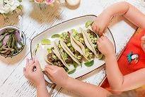 kids making tortilla